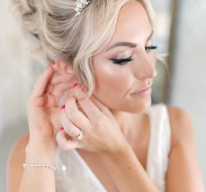 Stunning bride feeling relaxed at vaulty manor wedding venue