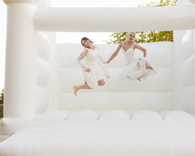 Stunning couple celebrate bouncy castle vaulty manor