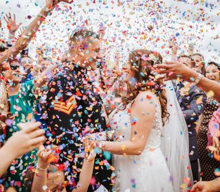 Wedding confetti and celebrations for the wedding couple vaulty manor essex venue